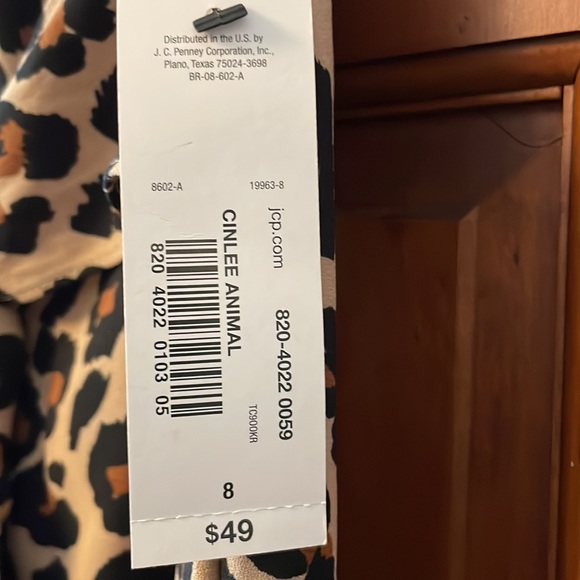 Woman’s size 8 Worthington faux wrap leopard print skirt. - Picture 8 of 9